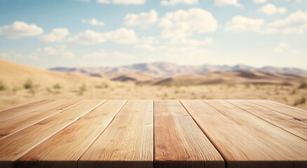 A wooden table in a desert landscape under a blue sky with clouds.