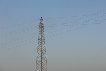 power lines against blue sky