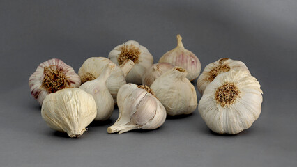 Garlics on a gray background - Isolated image