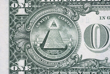 Reverse side of one dollar bill and pyramid with eye