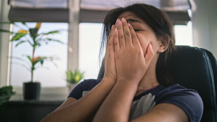 Close up of upset African American girl crying, discussing psychological trauma during therapy with psychotherapist. Stressed teenager finds solution on counseling session. Mental health concept.