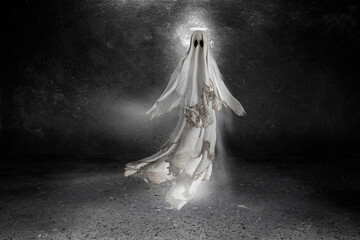 Floating scary white fabric ghost appeared among the ancient ruins in a nightmare. Creepy ghost Halloween character