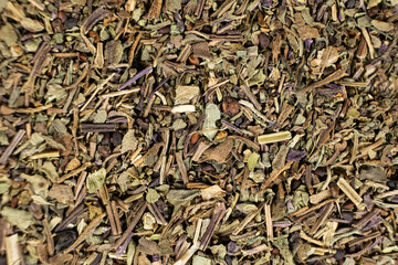 Dry basil spice seasoning macro texture top view
