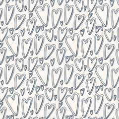 Seamless pattern with hearts in doodle style. Vector illustration.