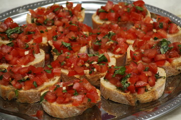 Italian bruscetta with baguette, tomatoes, garlic, parsley,
