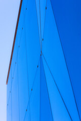 Geometric blue glass and the sky.