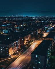 Obraz premium Nighttime view of the Olympic village, alive with the energy of athletes and the spirit of international camaraderie