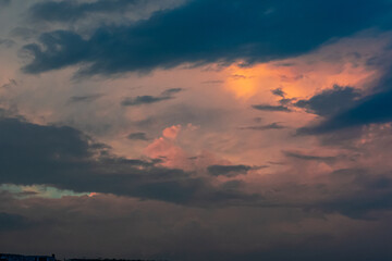 Avalon, New Jersey, USA - The view from the ocean looking at the homes on the coastline with dramatic clouds above them in this beach town on the southern New Jersey
