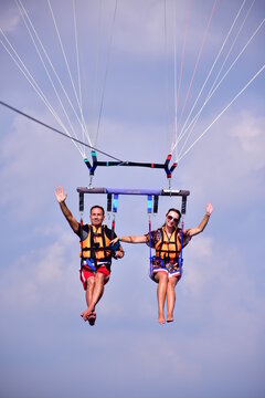 Parasaling over the sea . High quality photo