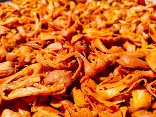 A top view of a pile of Javitri Spice(nutmeg)