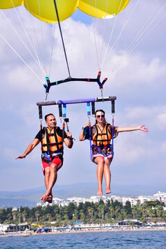 Parasaling over the sea . High quality photo