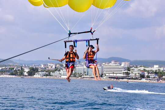 Parasaling over the sea . High quality photo