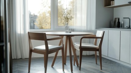 Fototapeta premium A space-saving round dining table with a foldable design, paired with sleek chairs in a bright and airy kitchen nook