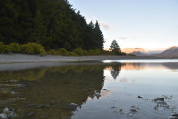 The stunning scenery and landscapes around the blue Lake Tekapo on the South Island of New Zealand