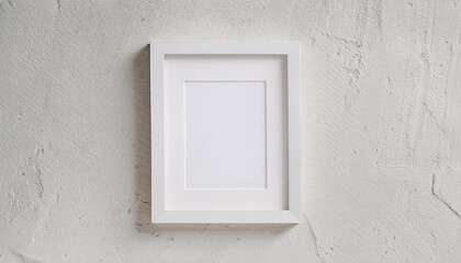 Frame on light textured stucco background. Minimalist display. Mock-up.