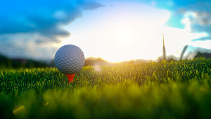 Golf ball on green grass in the evening golf course with sunshine background.