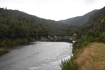 Hiking along the Punakaiki River Track and coastline in the Paparoa National Park, New Zealand