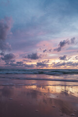 Fototapeta premium pink and orange sunset with clouds at karong beach in phuket