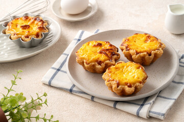 Delicious puff pastry Portuguese egg tart Pastel de nata in flower shape.