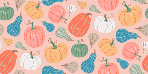 Seamless pattern of colorful pumpkins on pastel pink background.. Vector illustration in a flat retro style. Halloween, Thanksgiving, harvest, autumn season fabric, packaging, wrapping paper