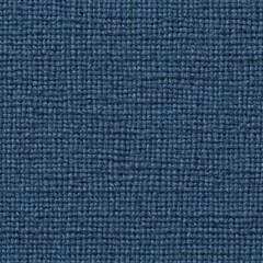 Close-up view of a blue cloth texture with soft folds and gentle sheen
