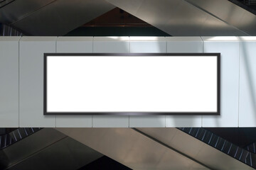 Mock up template: Long horizontal billboard out of home (OOH) advertising poster on side of parapet. Escalators in background. Light and shadow on frame. Transparent png file with shadows