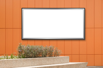 Large horizontal billboard out of home (OOH) advertising poster on modern tiled wall. Planter in the foreground. Clean design for mock up layout. Transparent png file with shadows