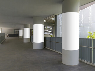 4 vertical blank poster templates on round pillars. Advertising pillar wrap mock ups along corridor walkway. Transparent png file with shadows.