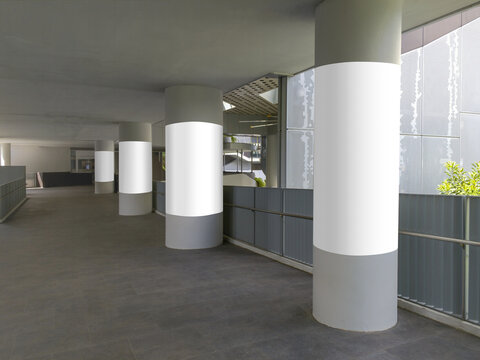4 vertical blank poster templates on round pillars. Advertising pillar wrap mock ups along corridor walkway. Transparent png file with shadows.