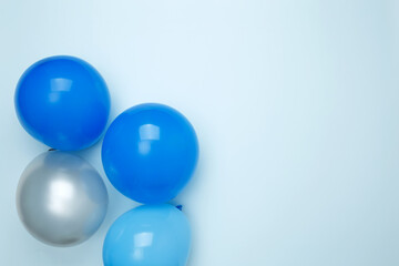 Birthday attributes colorful balloons. Concept of festive birthday celebrations