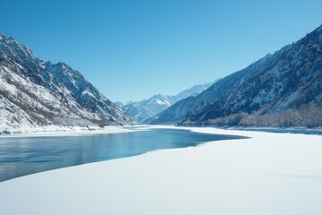 Frozen River Winding Through a Snow-Covered Mountain Valley