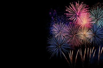 Fototapeta premium Colorful Fireworks Display Against a Dark Night Sky