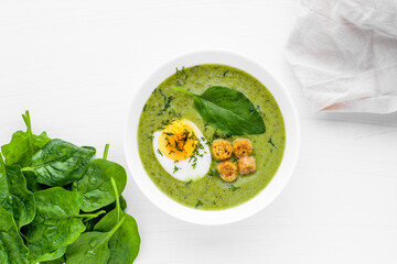 Green soup. Broccoli spinach cream soup in a bowl.