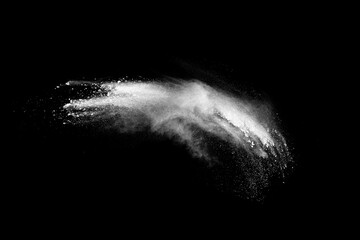White powder explosion on black background.