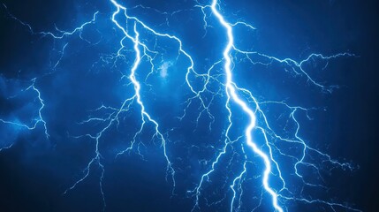 Striking blue lightning illuminating the night sky during a thunderstorm over an urban landscape
