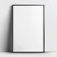 Mockup of a 2x3 vertical black frame against the light gray wall. Artwork, art print, wall art mockup. Blank framed picture with copy space, minimalist, simple.