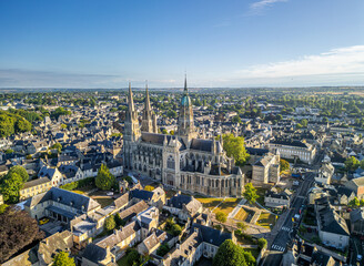 The drone aerial view of Bayeux Cathedral, also known as Cathedral of Our Lady of Bayeux is a Roman...