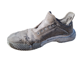 Wasted running shoe isolated photo