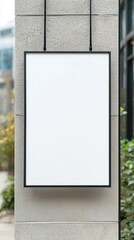 A white sign is hanging from a wall