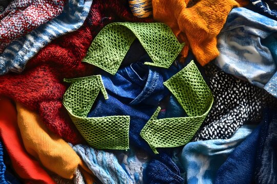 eco-friendly and sustainable clothing in shape of recycling sign