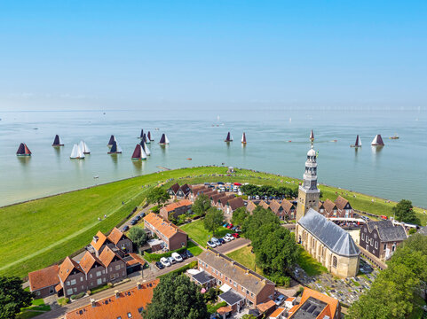 Aerial from the town Hindeloopen during the sailing competition skutsjesilen on the IJsselmeer in the Netherlands