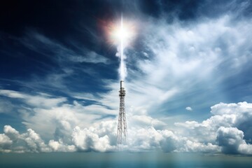 A powerful beam of energy from a cell phone tower shoots up into the sky, piercing through the clouds and reaching a distant satellite orbiting Earth.