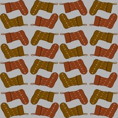Pattern of festive stocking designs in warm tones on a gray background during winter season