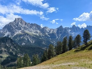 Alpine Wonderland - Explore the stunning beauty of the Dolomites with this panoramic view of snow-capped peaks