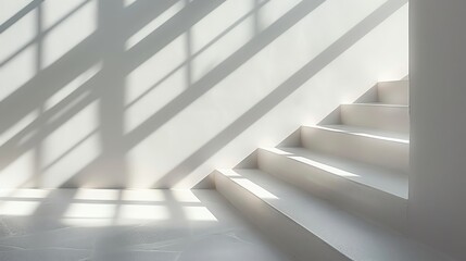 Fototapeta premium Minimalist staircase casting shadows with natural light, creating a serene and calming atmosphere in a modern interior space.