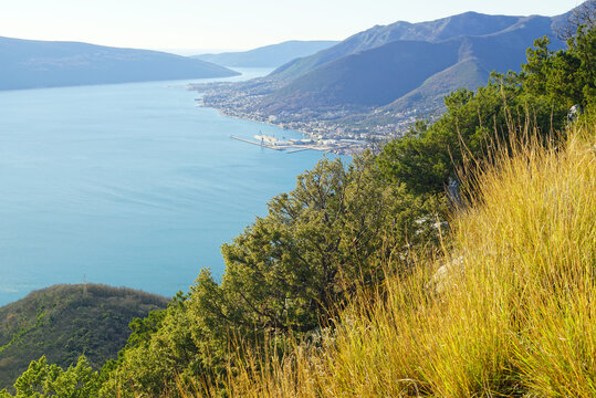 View of the Bay of Kotor from Mount Vrmac: the Adriatic Sea, mountains and the riviera of the municipality of Herceg Novi with the settlements of Bijela, Bao&scaron;ići, Kumbor and Djenovici (Montenegro)