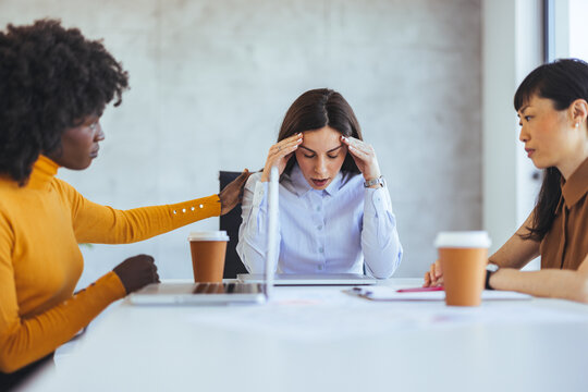 Women in Business Meeting With Supportive Gesture