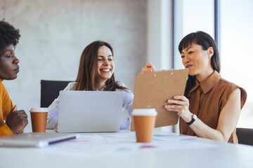 Diverse Team Collaborating in Modern Office Environment