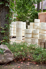 Naklejka premium classic palletized columns for building a pergola stand in the backyard in the garden