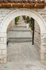 The famous old town of Berat in Albania. Picturesque street with houses from the Ottoman era. Beautiful landscape in central Albania.